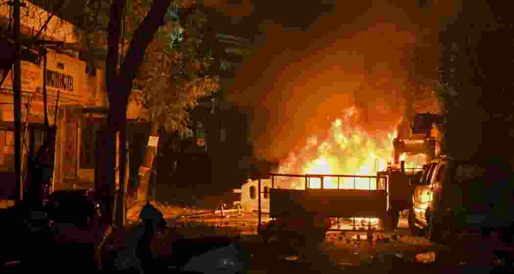 Vehicles burn after clashes erupted due to demands over removal of the tomb of Mughal emperor Aurangzeb, in Nagpur, India, March 17, 2025.