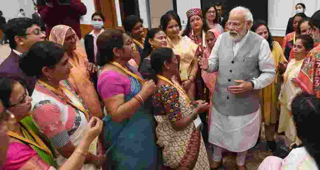 A file photo of Prime Minister Narendra Modi salutes 'nari shakti' on Women's Day.