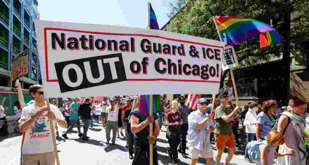 Marchers at a Labor Day rally in Chicago protested President Trump's threatened National Guard deployment.