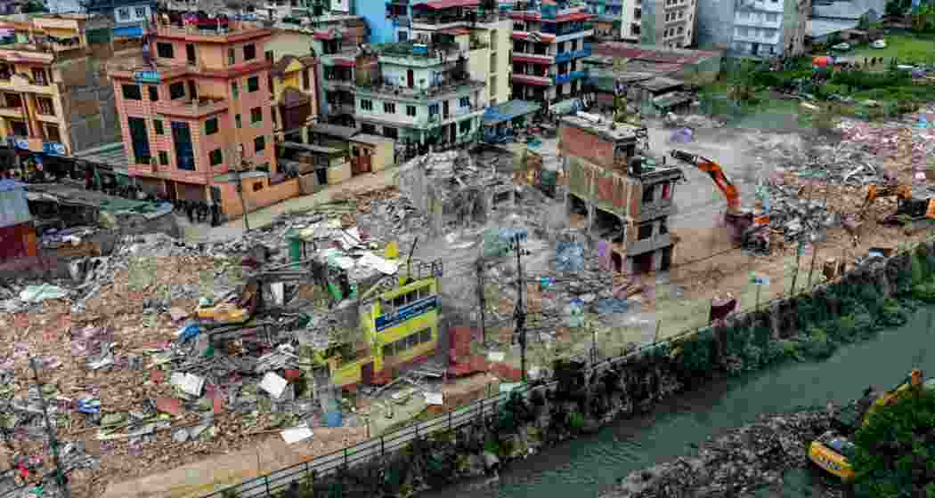 Demolition of illegal structures underway along a riverbank in Kathmandu Valley as part of the government’s clearance drive that has displaced thousands of landless squatters.