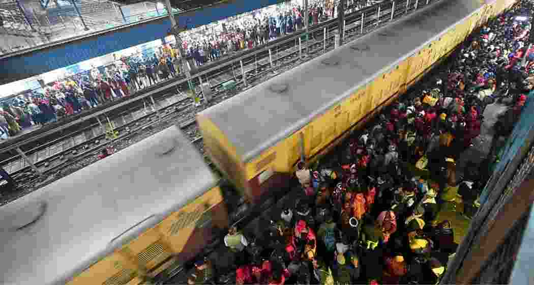 Crowds surge at New Delhi Railway Station, where a stampede on platform 14 killed 18 people as thousands of passengers headed to Prayagraj for the Maha Kumbh 2025 festival.