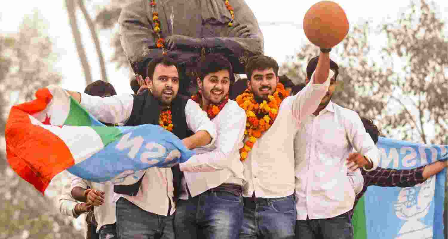 Newly elected DUSU President Ronak Khatri of NSUI, Joint Secretary Lokesh Chaudhari and others pose for photographs as they celebrate after their win in Delhi University Students Union (DUSU) 2024 elections at Delhi University.