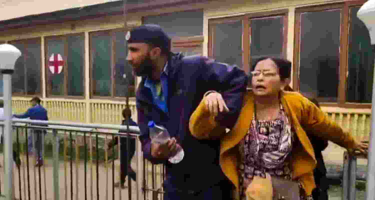 An injured being brought for treatment at a hospital, after terrorists attacked a group of tourists at Pahalgam, in Anantnag district, Jammu & Kashmir, Tuesday.