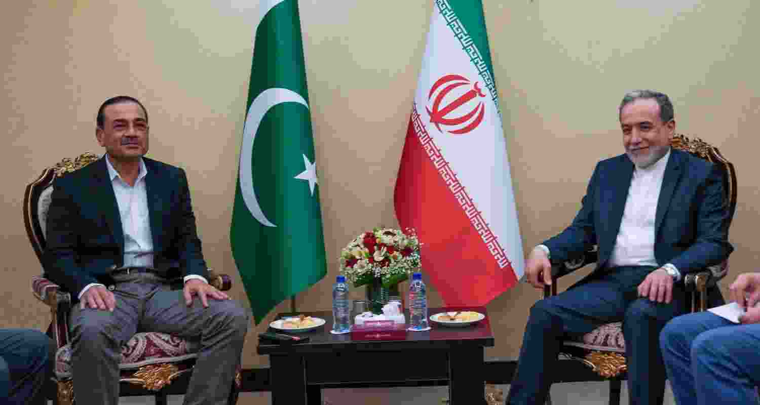 In this photo released by the Iranian Foreign Ministry, Iranian Foreign Minister Abbas Araghchi, right, meets with Pakistan's Army Chief Field Marshal Gen. Asim Munir in Tehran, Wednesday, April 15, 2026.