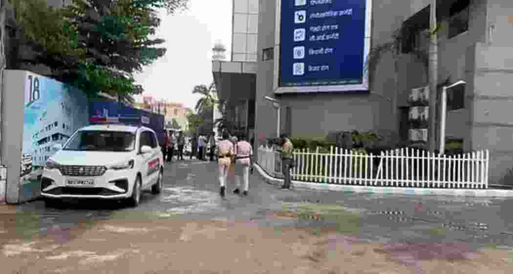 Policemen deployed outside Paras Hospital in Patna where gangster Chandan Mishra was shot by suspected rivals while on parole.