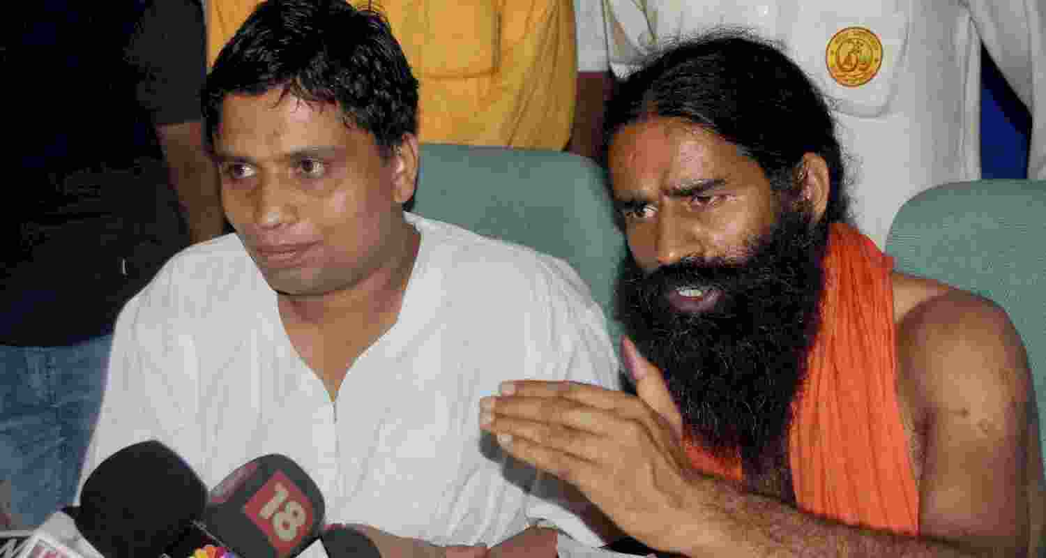 Ramdev and his close aide Balkrishna. 