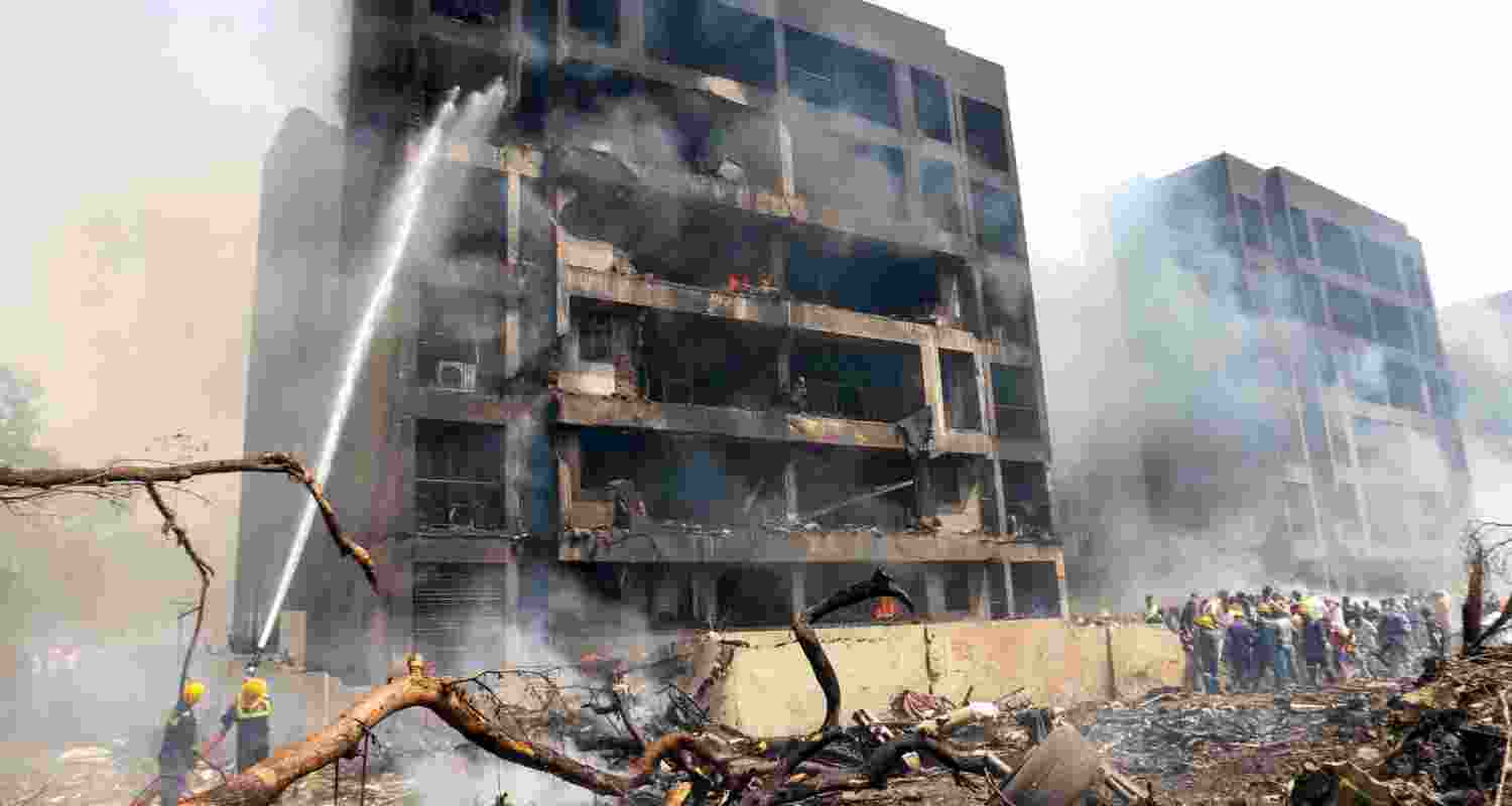 Firefighting team at the spot after an Air India plane crashed in Meghaninagar area, near Ahmedabad airport, Thursday.