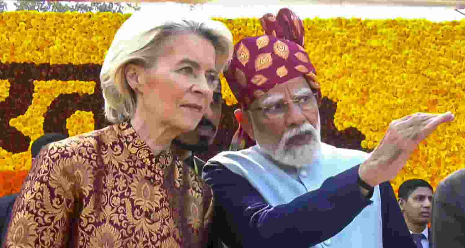 Prime Minister Narendra Modi, centre, with President of the European Commission Ursula von der Leyen during the 77th Republic Day Parade, at Kartavya Path. 