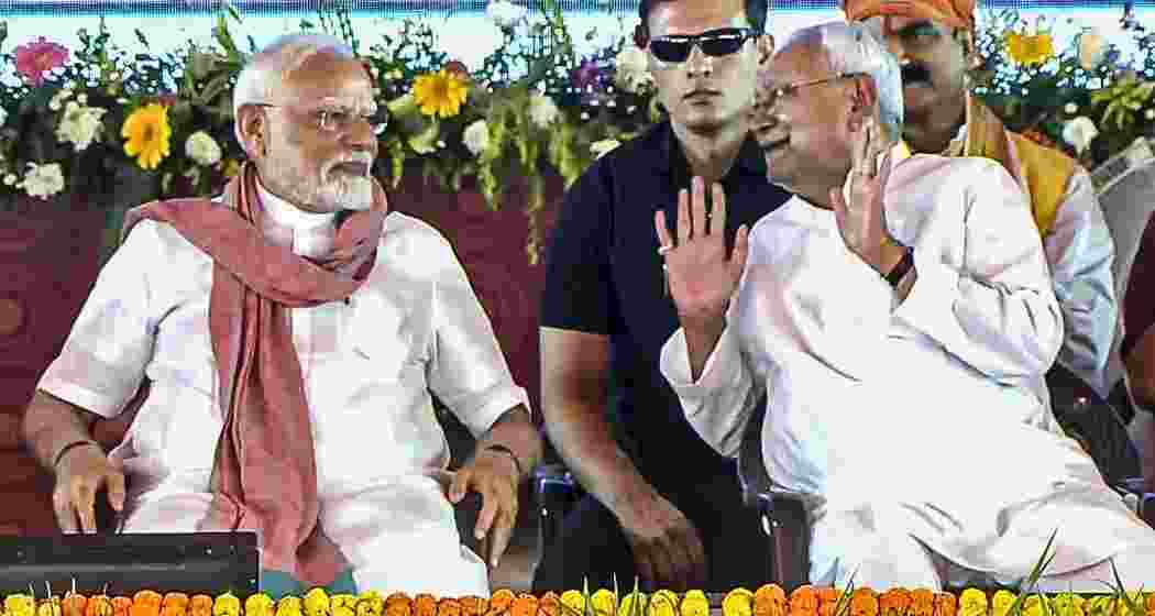  Prime Minister Narendra Modi with Bihar Chief Minister Nitish Kumar during the National Panchayati Raj Day programme, in Madhubani district, Bihar on Thursday. (PMO via PTI Photo)