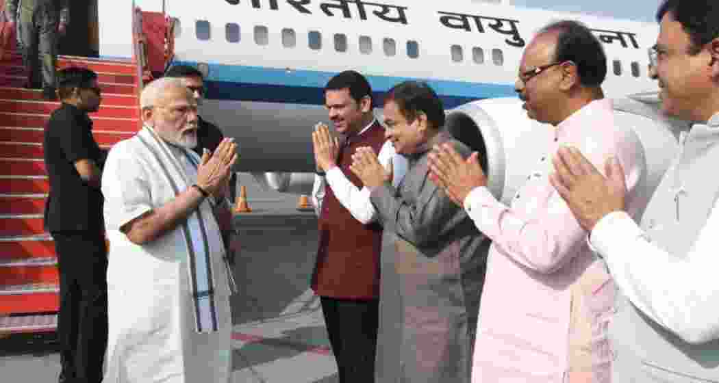 PM Narendra Modi is welcomed by Maharashtra CM Devendra Fadnavis and Union Minister Nitin Gadkari upon his arrival at Nagpur airport, ahead of his visit to key sites and project inaugurations.