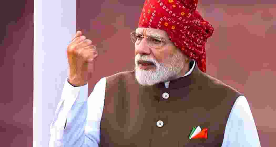 Prime Minister Narendra Modi during his Independence Day address at the Red Fort, wearing a traditional bandhej turban and tricolour pocket square.
