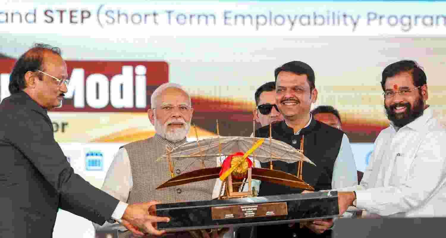 Prime Minister Narendra Modi with Maharashtra Chief Minister Devendra Fadnavis and Deputy Chief Ministers Ajit Pawar and Eknath Shinde during the inauguration of Phase 1 of the Navi Mumbai International Airport and launch of other development projects, in Navi Mumbai, Maharashtra. 