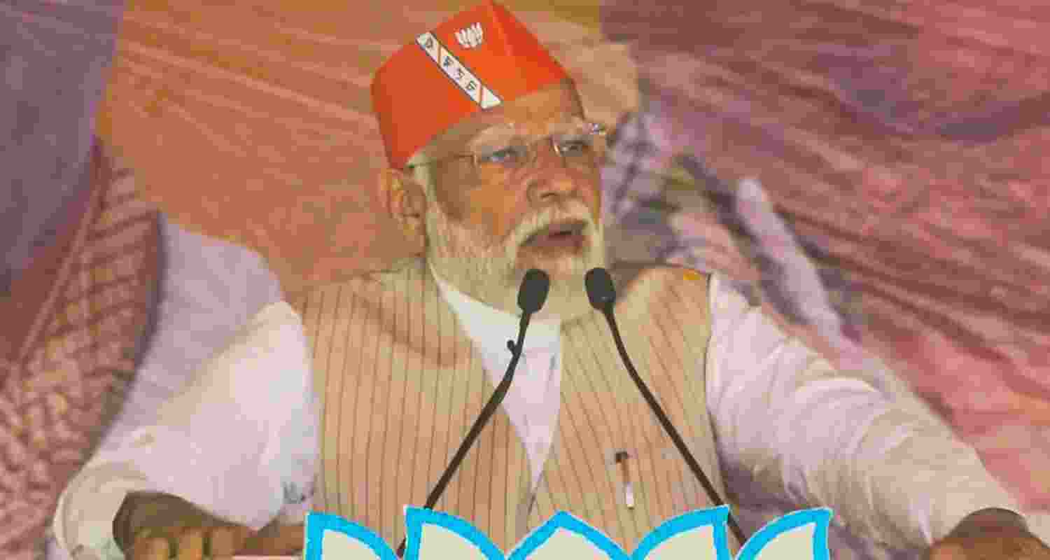 Prime Minister Narendra Modi addresses a public meeting, in West Bengal's Krishnanagar. 
