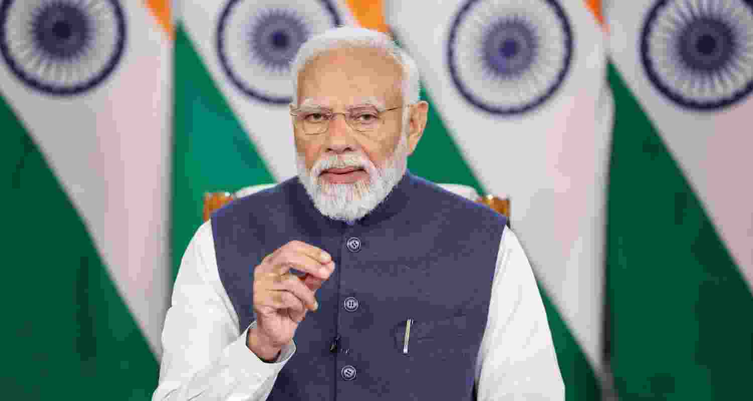 An image of PM Modi addressing the media.