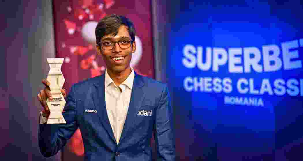 Indian Grandmaster R. Praggnanandhaa poses for the camera after winning the Superbet Classic in Bucharest on Saturday.