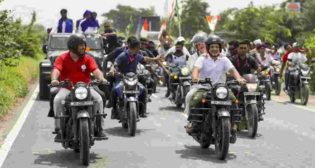 Leader of Opposition in the Lok Sabha Rahul Gandhi, Congress leader Priyanka Gandhi Vadra and RJD leader Tejashwi Yadav ride motorcycles with others during the Voter Adhikar Yatra, in Bihar. 