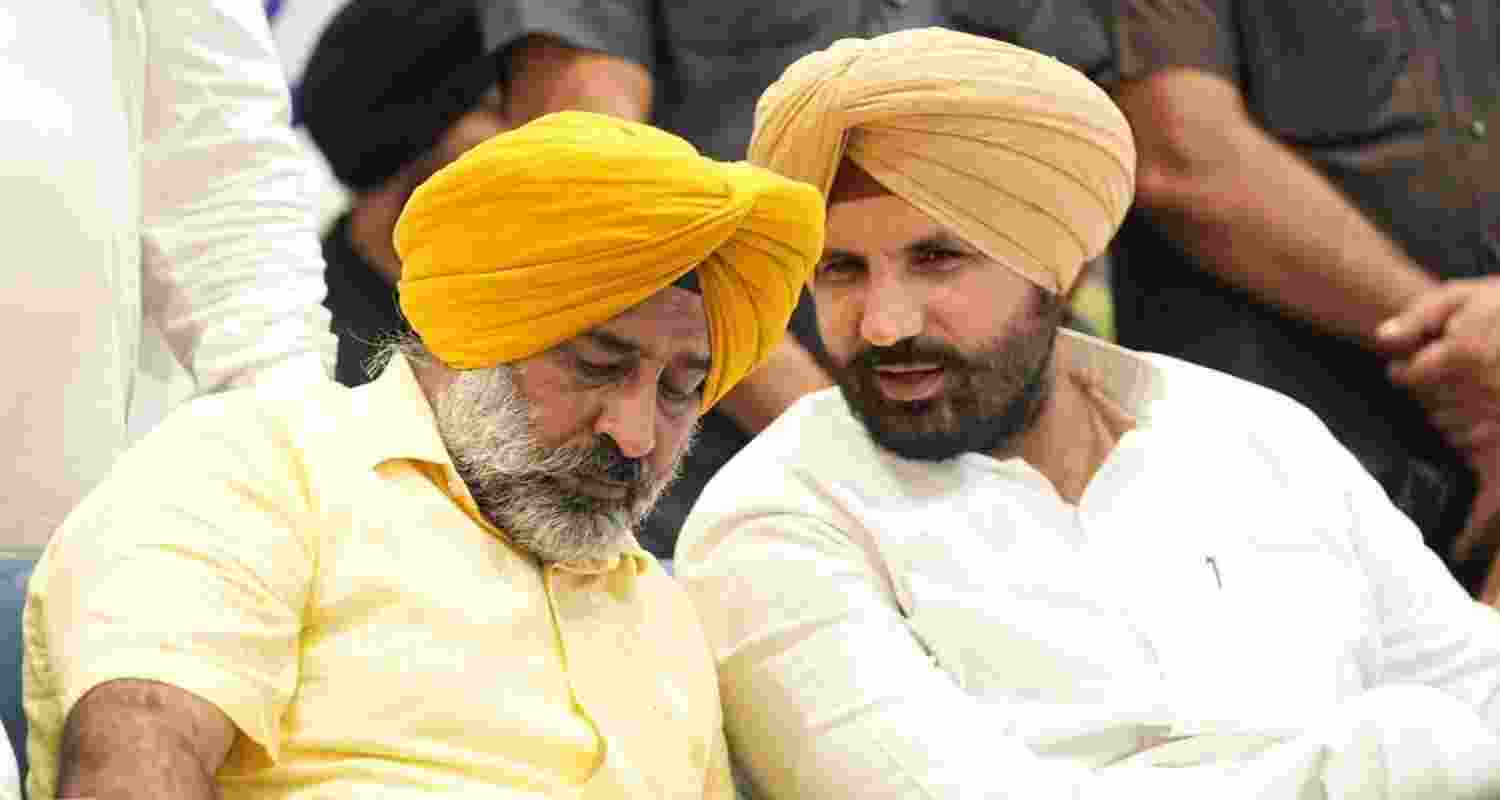 Punjab Congress president Amrinder Singh Raja Warring with former Olympian and captain of the Indian hockey team Pargat Singh.