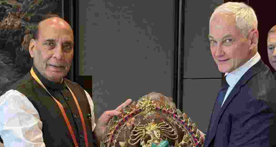 Defence Minister Rajnath Singh presents a Nataraj statue to his Russian counterpart Andrey Belousov during their meeting on the sidelines of the SCO summit in Qingdao, China."