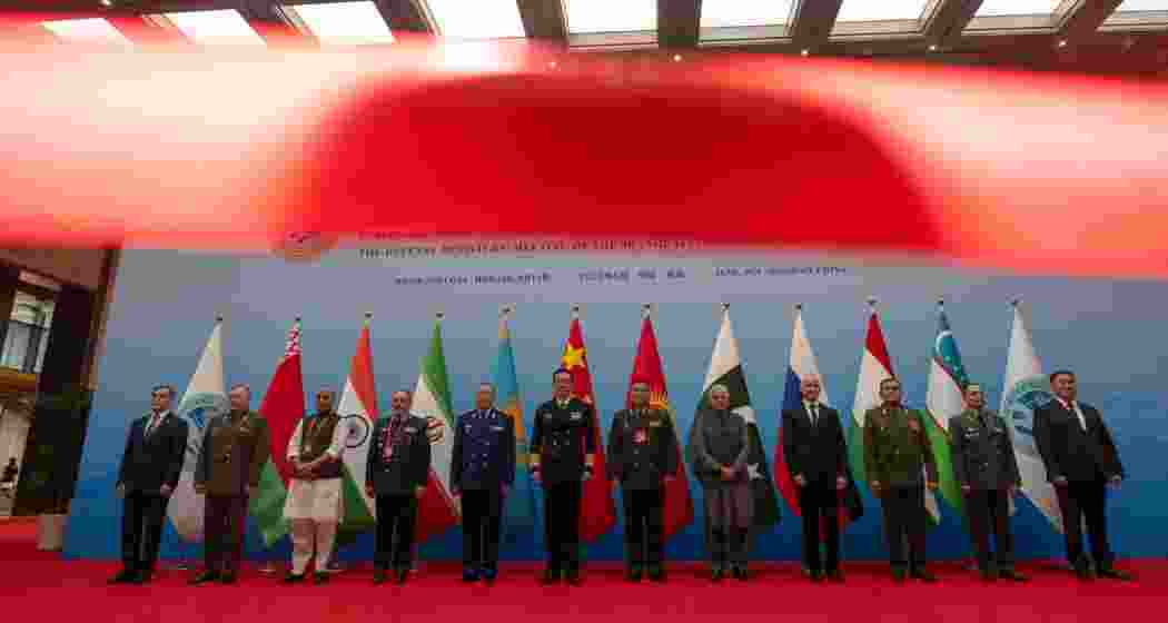 Chinese Defense Minister Dong Jun, center, leads other heads of defense including Russian Defense Minister Andrei Belousov, fourth right, Iran Defense Minister Aziz Nasirzadeh, fourth left, for a group photo ahead of the Defense Ministers' Meeting of the Shanghai Cooperation Organization Members States in Qingdao in eastern China's Shandong province on Thursday, June 26, 2025.
