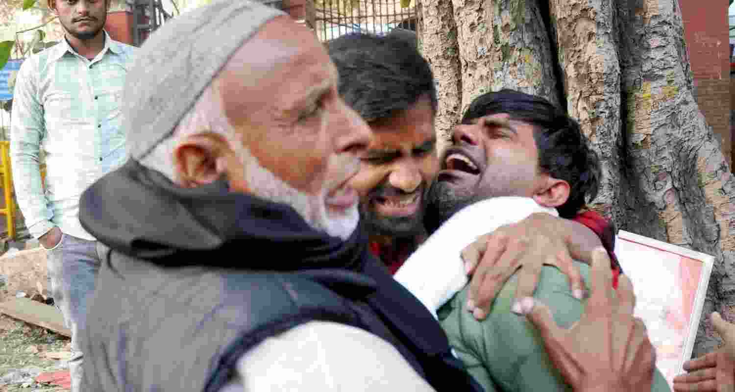 Tattoos and torn clothes: How families found their loved ones