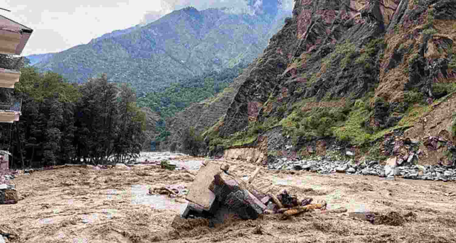 The gushing water carried huge amounts of debris, which spread across agricultural land.