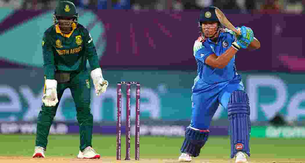 Indian batter Richa Ghosh plays a powerful shot against South Africa during the Women’s World Cup match at ACA-VDCA Stadium.