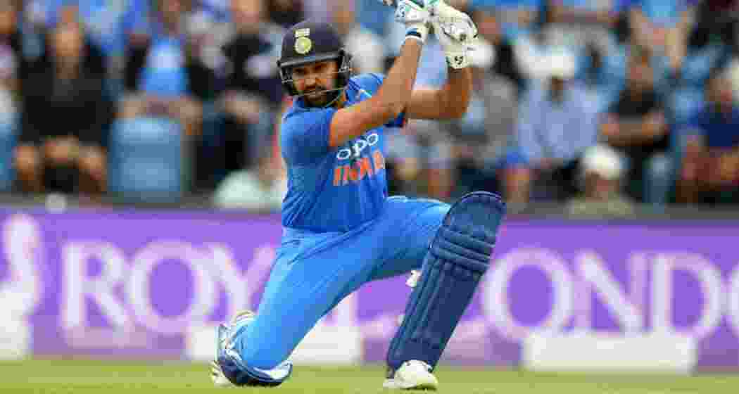 Indian batter Rohit Sharma plays a shot.