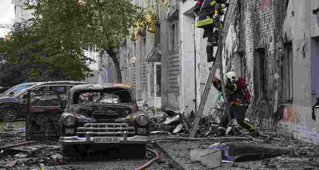 Ukrainian firefighters in action following Russia’s midnight drone strike in Kyiv. At least five locations were hit as Putin announced new offensives in Sumy and Odessa regions.