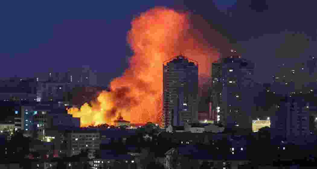 Smoke rises above Kyiv following Russia’s retaliatory drone and missile assault on Friday. The barrage caused multiple fatalities, infrastructure damage, and sparked fires in residential and industrial areas across the capital.