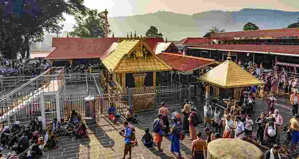 People gather outside the Sabarimala Temple.