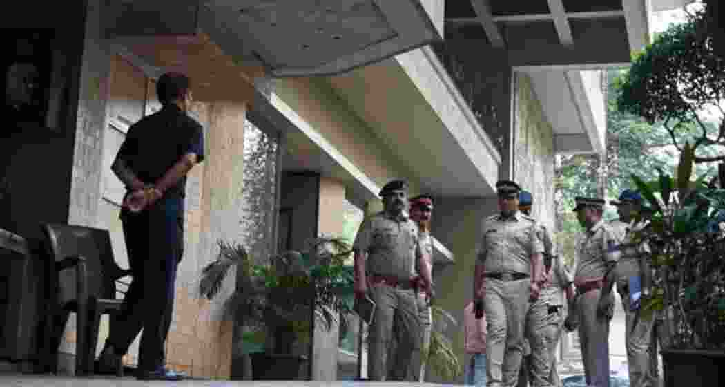 Security officials during an investigation at Bollywood actor Saif Ali Khan's residence after an intruder attacked him with a knife, at Bandra, in Mumbai.