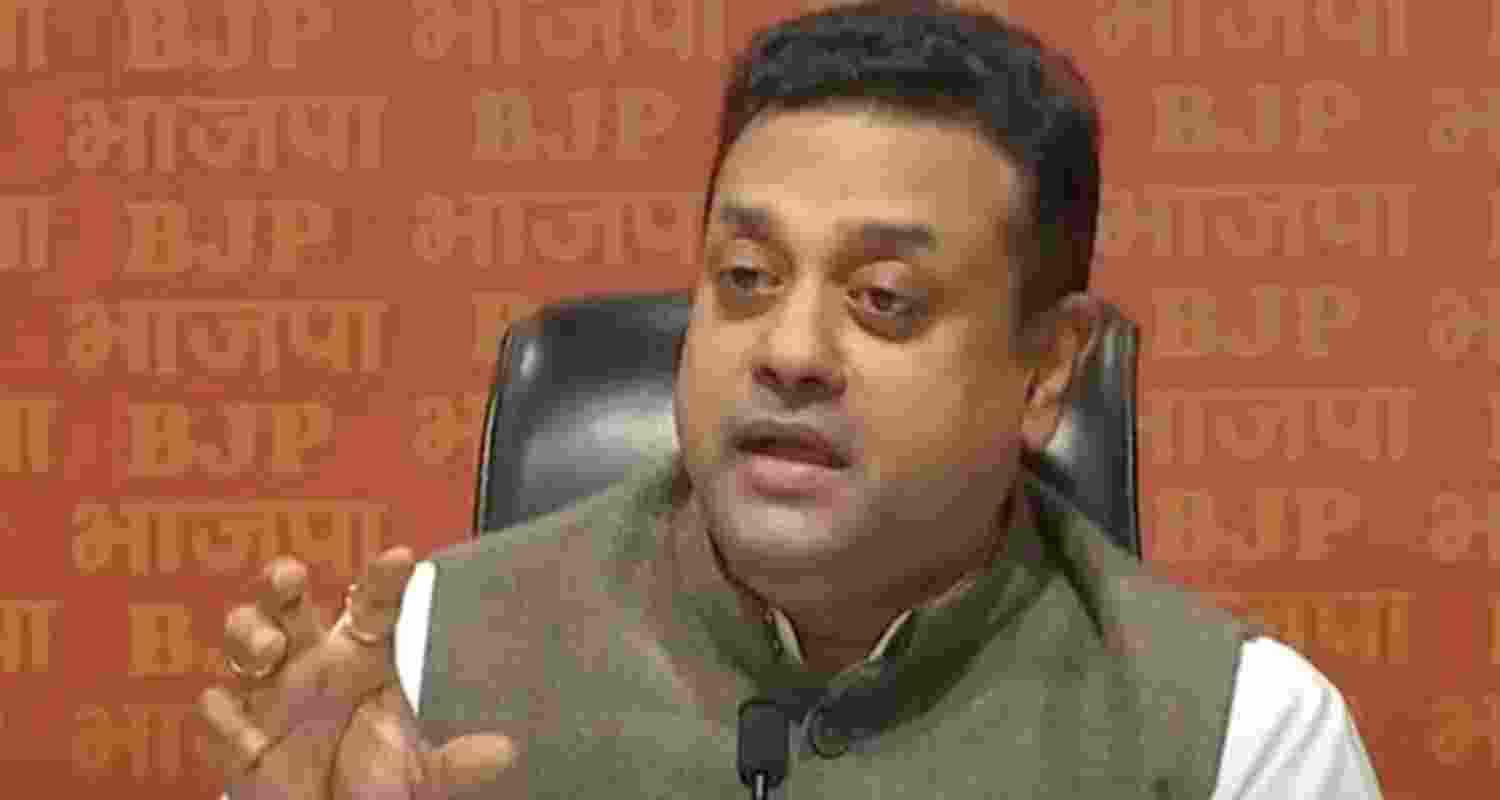 Sambit Patra addressing a press conference at the BJP headquarters in New Delhi on Friday.