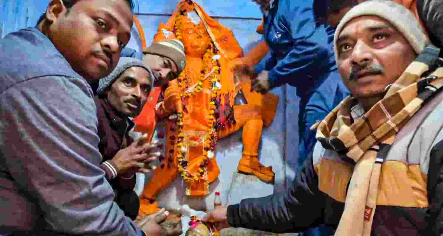 Devotees offer prayers at Shri Kartik Mahadev Temple (Bhasma Shankar temple) that reopened on December 13 after being shut for 46 years, in Sambhal, UP.