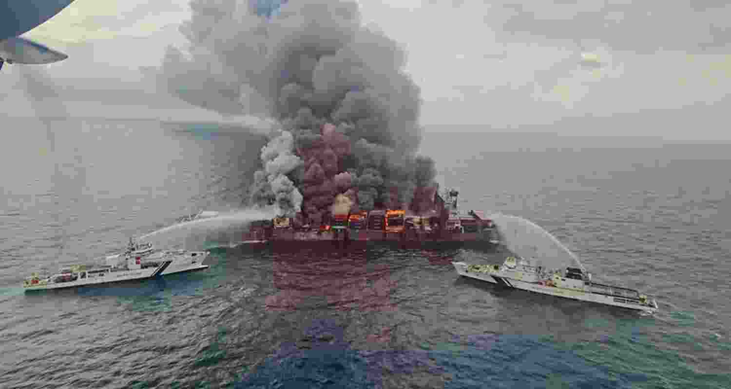 Fire largely contained on Singapore vessel; ship slightly tilted