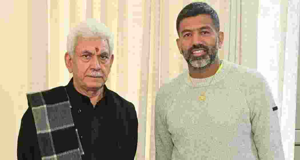 Tennis star Rohan Bopanna and Lieutenant Governor Manoj Sinha during a meeting in Bengaluru, where Bopanna shared his plans for an initiative to empower young talent from Jammu and Kashmir.