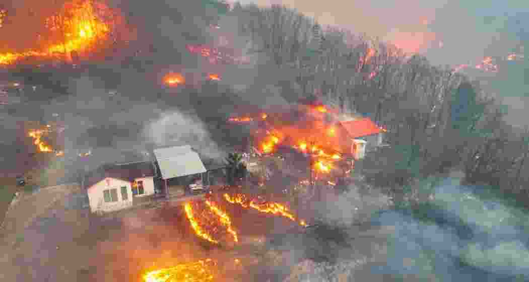 A house is surrounded by wildfire that devastates the area, in Uiseong, South Korea, March 24. 