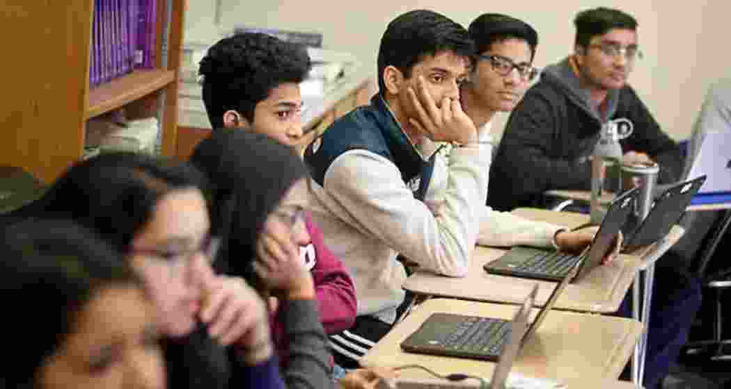 Indian students attend a class at a university in the US.