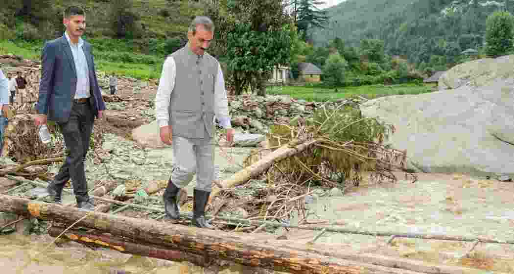 Himachal Pradesh Chief Minister Sukhvinder Singh Sukhu visits a disaster-affected area, in Mandi district, Himachal Pradesh.