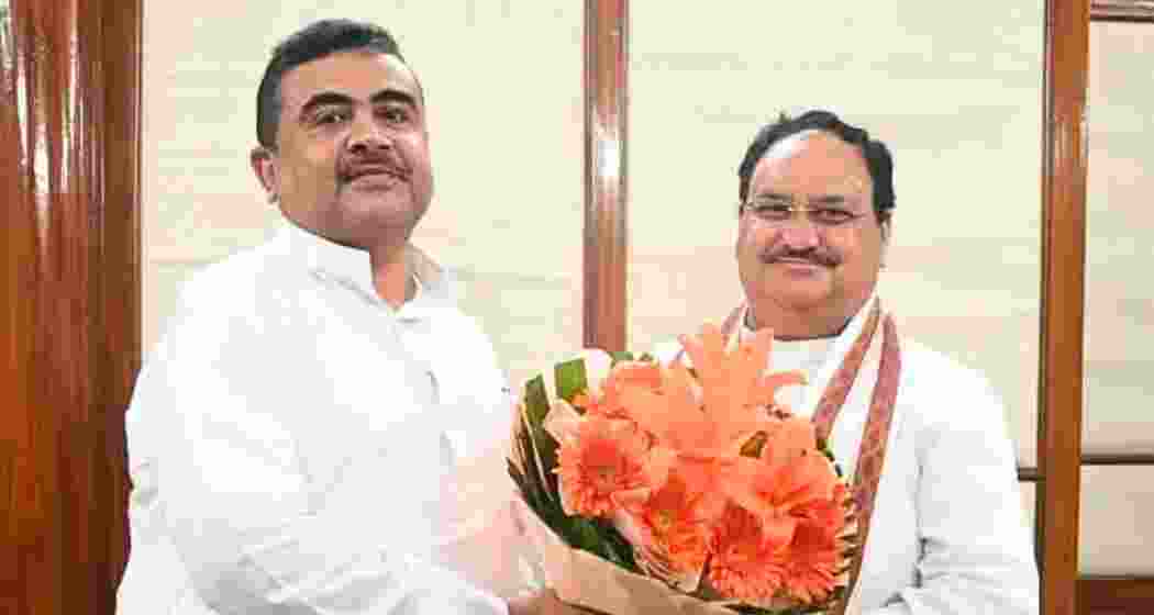 West Bengal Chief Minister Suvendu Adhikari with Union Health Minister J P Nadda in New Delhi on Saturday. 