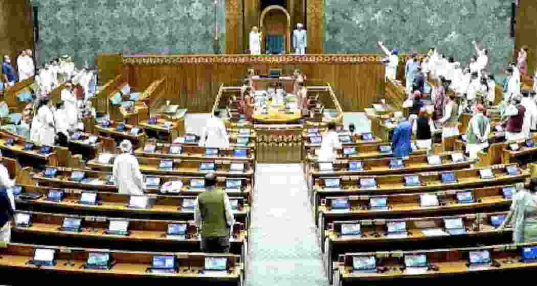Opposition leaders staging a protest in the Lok Sabha during the monsoon session of Parliament in New Delhi on Monday.