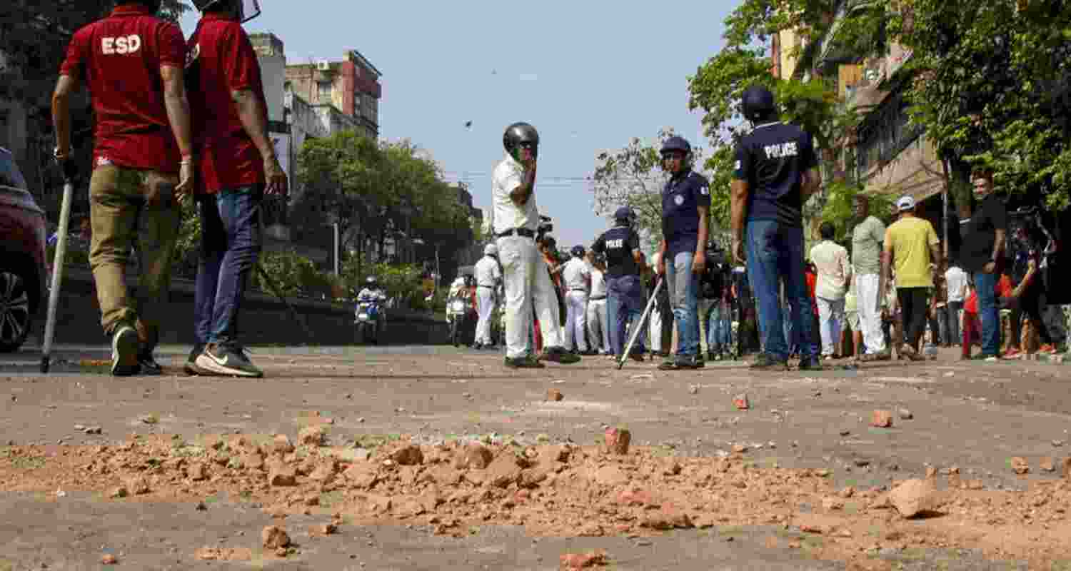  Brick debris lies scattered on ground after clashes broke out between TMC and BJP supporters, barely half an hour before Prime Minister Narendra Modi's rally at the Brigade Parade Ground, in Kolkata, Saturday, March 14, 2026. 