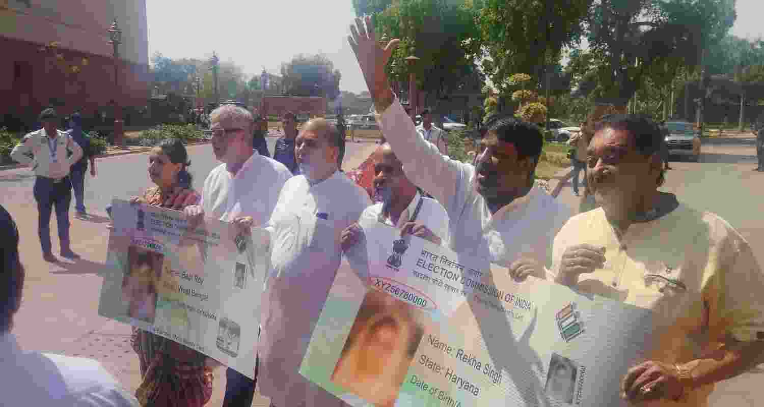 TMC MPs protest over duplicate voter ID cards issue in Parliament