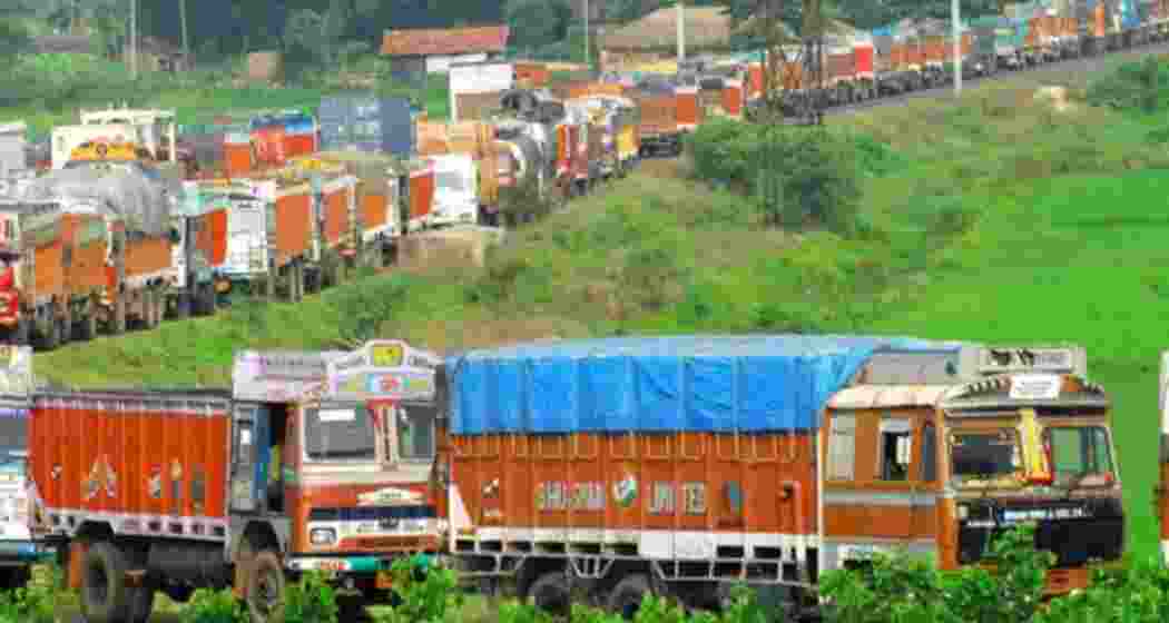 Stranded trucks carrying essential goods await passage at the Mao checkgate on the Manipur-Nagaland border as tonnes of vegetables and fish begin to rot amid an ongoing blockade.