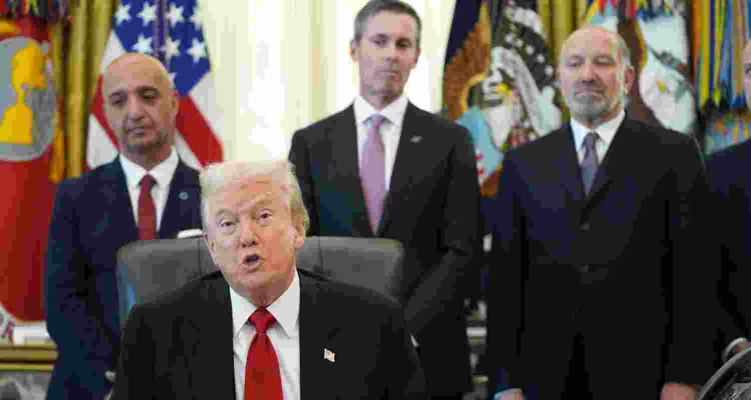 President Donald Trump speaks as Novo Nordisk President and CEO Mike Doustdar, from left, Eli Lilly CEO David Ricks and Commerce Secretary Howard Lutnick listen during an event about drug prices, Thursday.