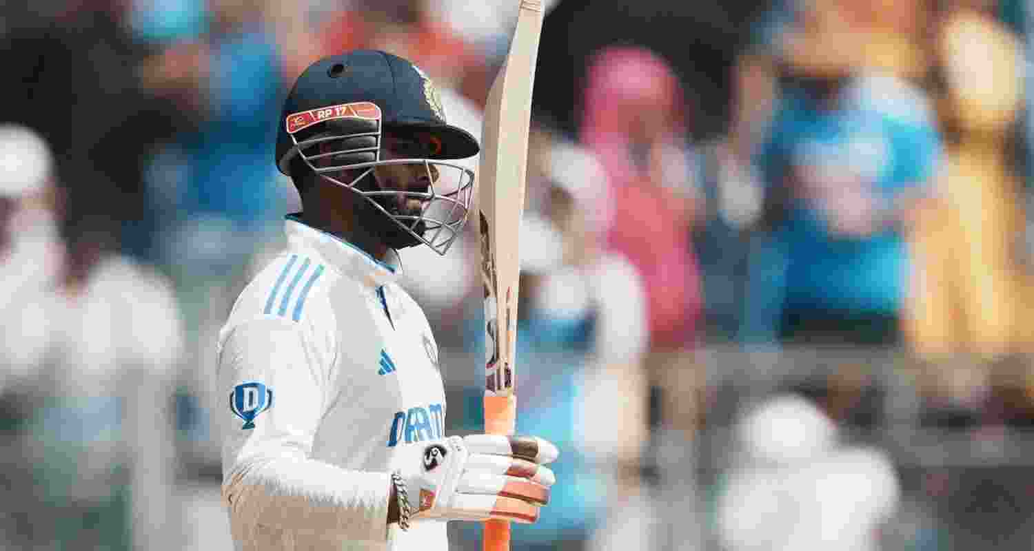 India's Rishabh Pant celebrates his fifty runs during day three of third Test cricket match between India and New Zealand at Wankhede Stadium, in Mumbai, Sunday, Nov. 3, 2024. 