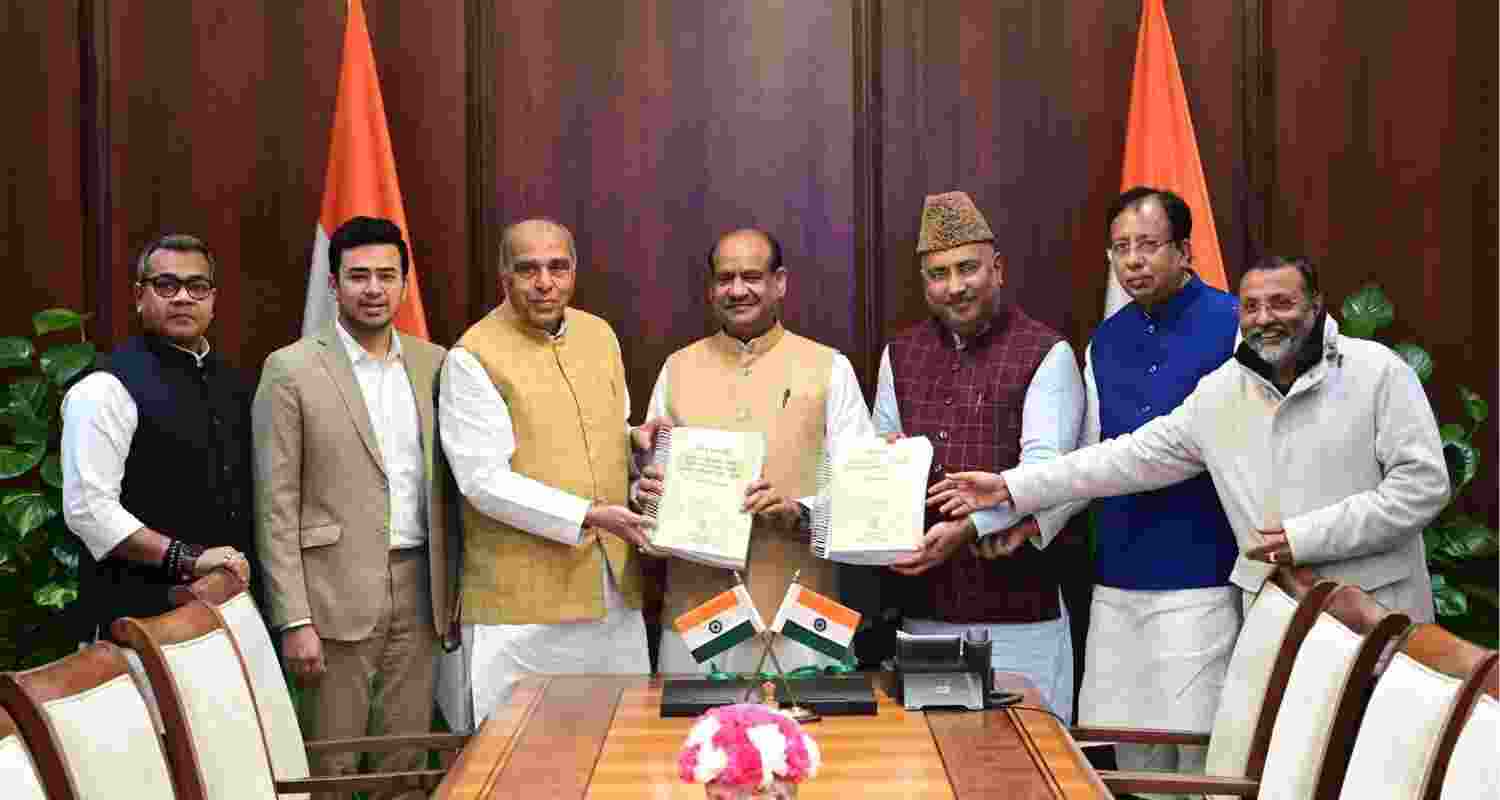 Jagdambika Pal leads submission of Waqf Bill report to Lok Sabha speaker despite opposition objections.