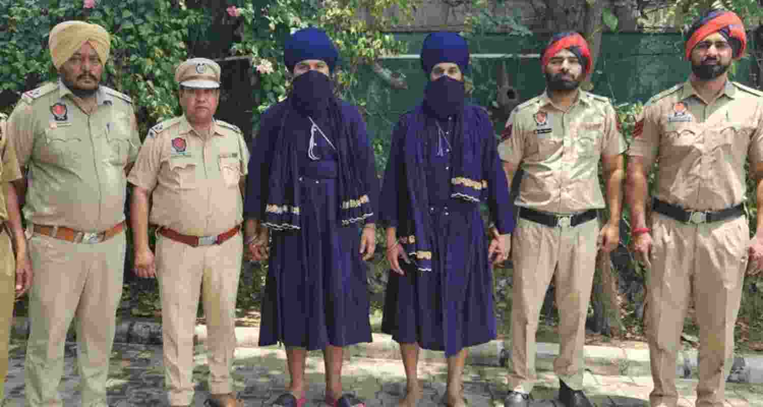 Police, with the two suspects, Nimaratjeet Singh and Jaspreet Singh, who were sent to judicial custody on Wednesday