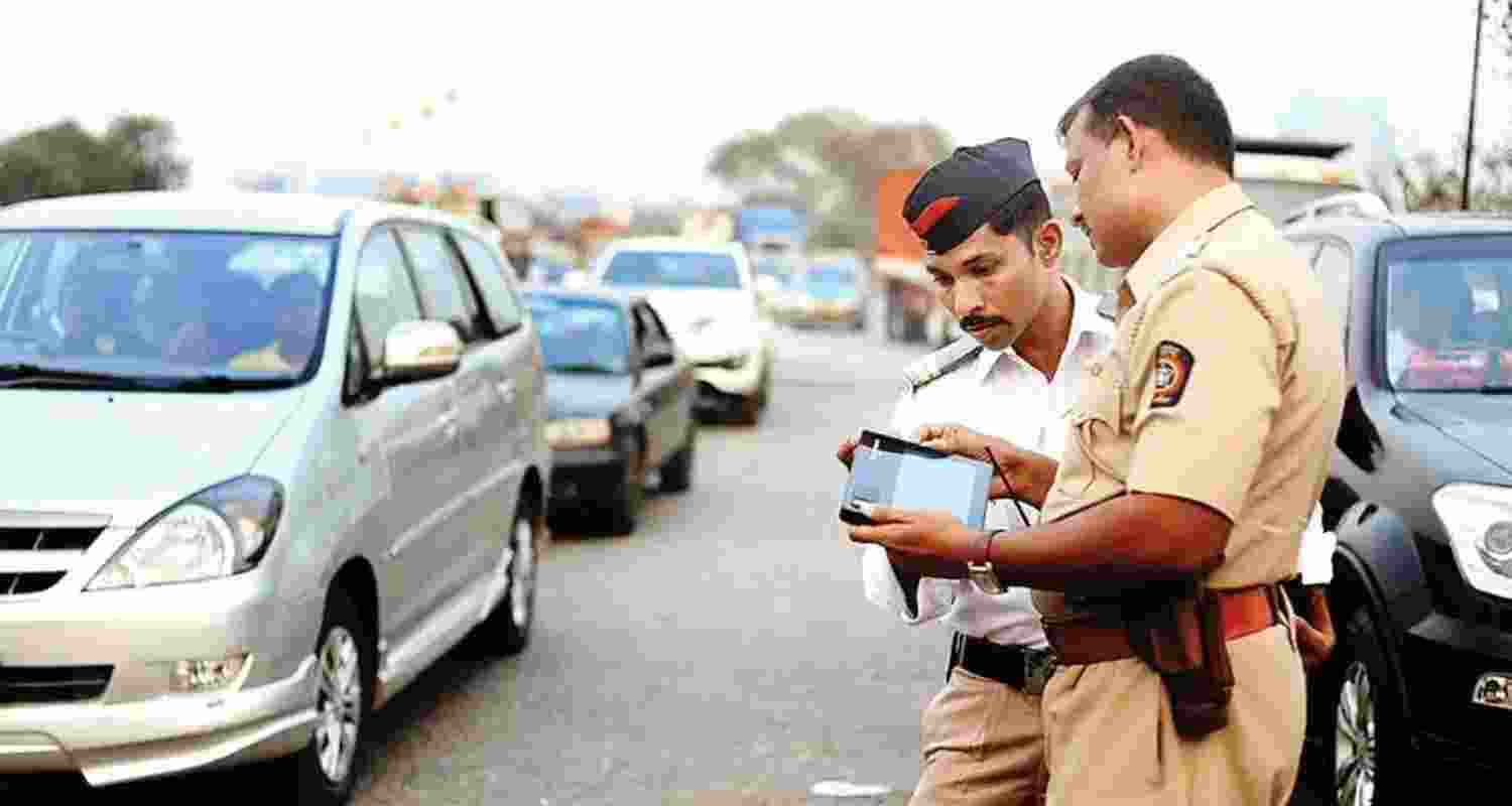 Car owner in UP fined for not wearing helmet