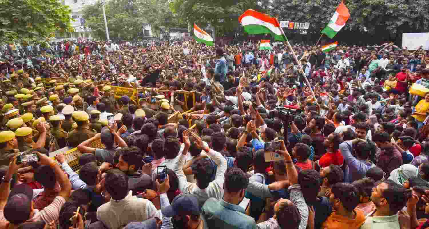 Aspirants stage a protest against the UPPSC, demanding the implementation of 'Single Day, Single Sheet' exams, in Prayagraj, Thursday.