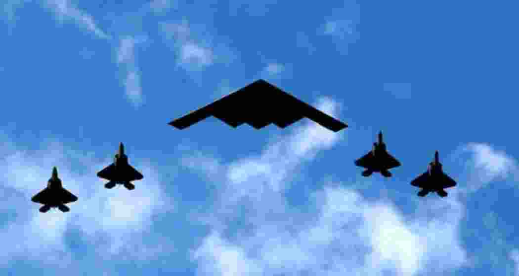A US B-2 stealth bomber flies in synchronisation with F-22 Raptors during the strike mission targeting Iran’s nuclear sites at Fordow, Natanz and Isfahan.